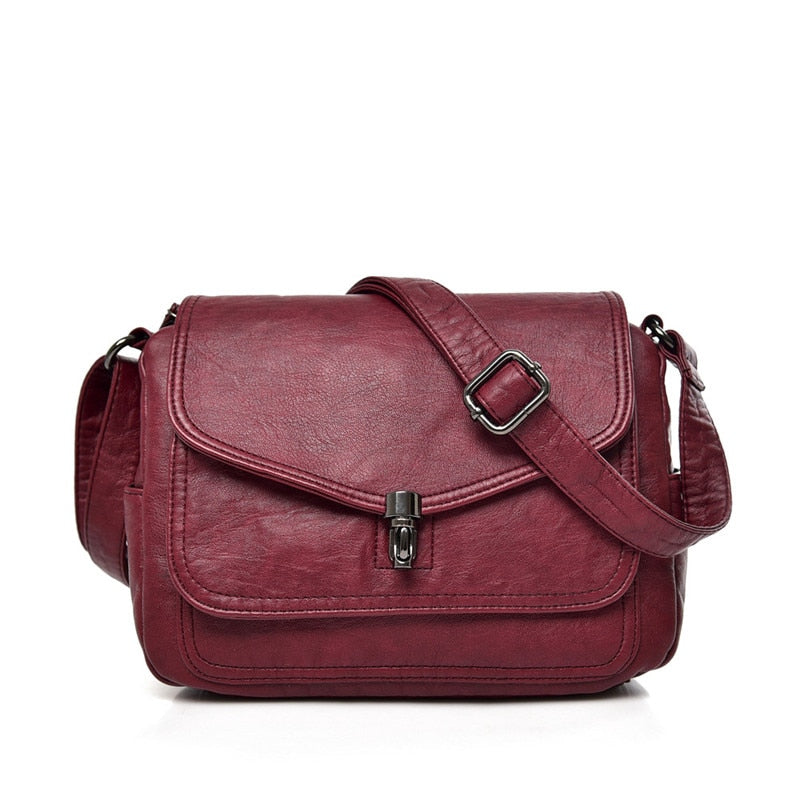 Bolso bandolera compacto con diseño minimalista y correa ajustable – CAROLYN