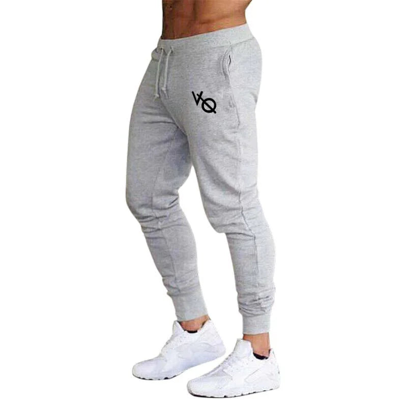 Pantalón deportivo slim fit con puños en los tobillos para hombre – DEXTER