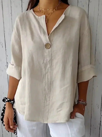 Blusa femenina moderna y cómoda con cuello asimétrico y diseño relajado – LÉONIE