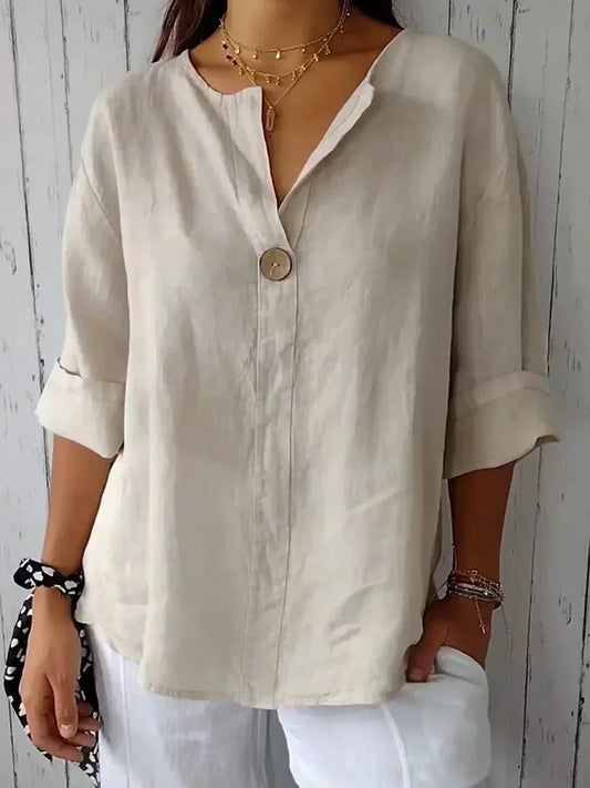 Blusa femenina moderna y cómoda con cuello asimétrico y diseño relajado – LÉONIE