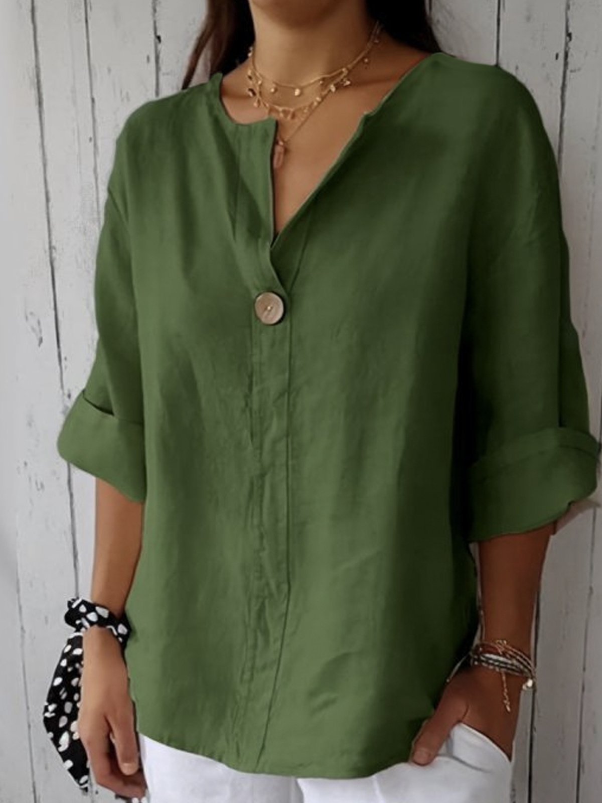 Blusa femenina moderna y cómoda con cuello asimétrico y diseño relajado – LÉONIE