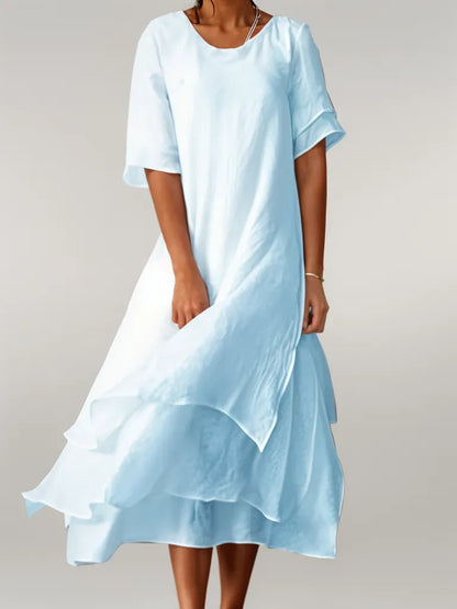 Vestido largo de algodón suave con cuello redondo y corte fluido – LUMÉRIA