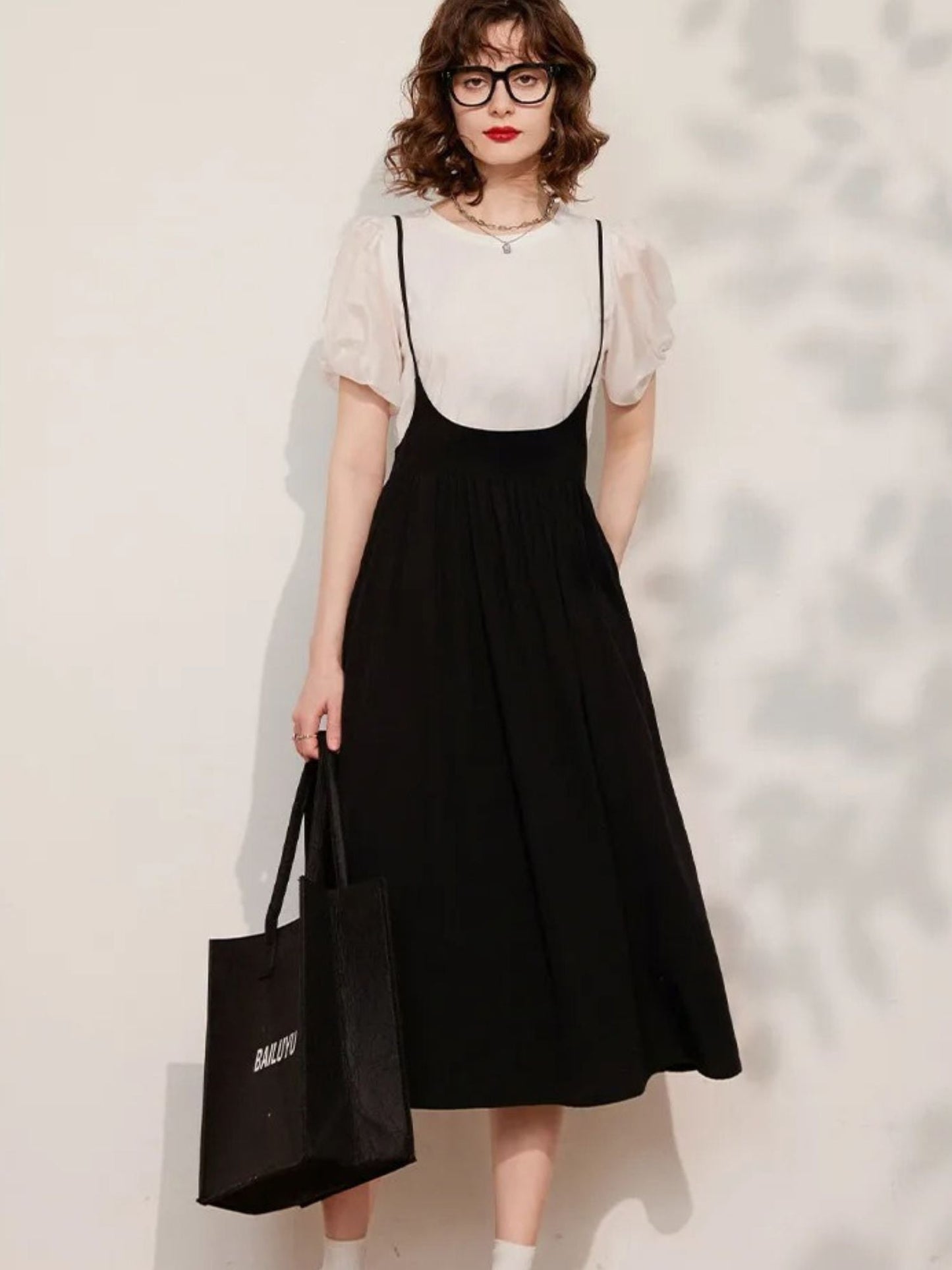 Conjunto de top con mangas abullonadas y falda midi – LIDIA