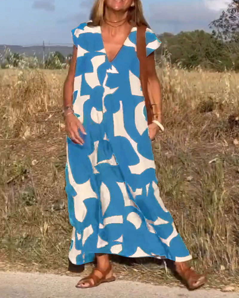 Vestido estampado con escote en V y corte fluido – STEPHARA
