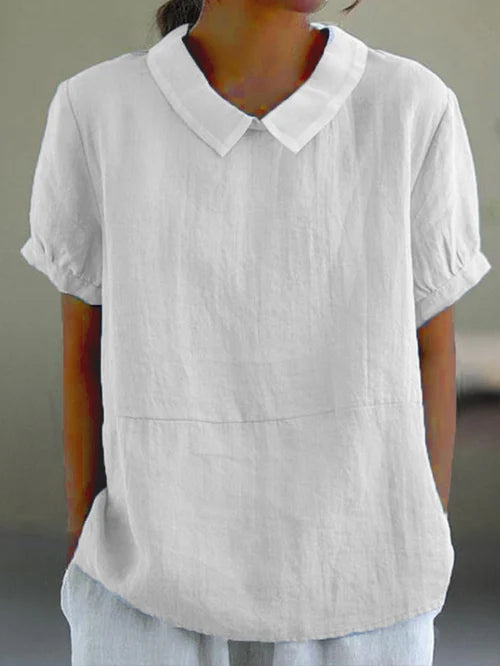 Blusa fluida con cuello alto y corte relajado – ÉLISA