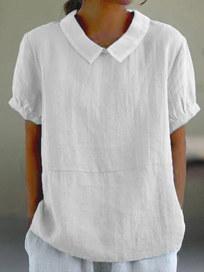 Blusa fluida con cuello alto y corte relajado – ÉLISA
