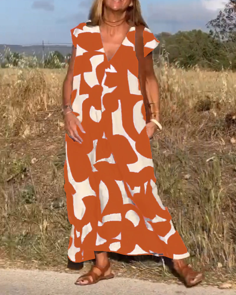 Vestido estampado con escote en V y corte fluido – STEPHARA