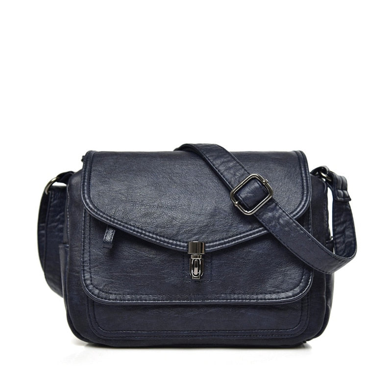Bolso bandolera compacto con diseño minimalista y correa ajustable – CAROLYN