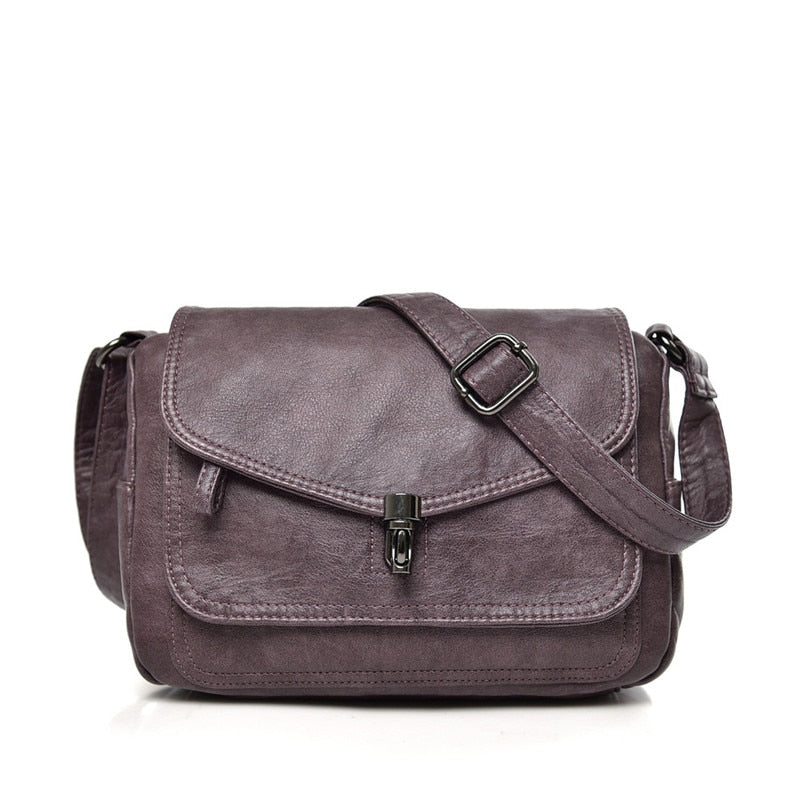 Bolso bandolera compacto con diseño minimalista y correa ajustable – CAROLYN