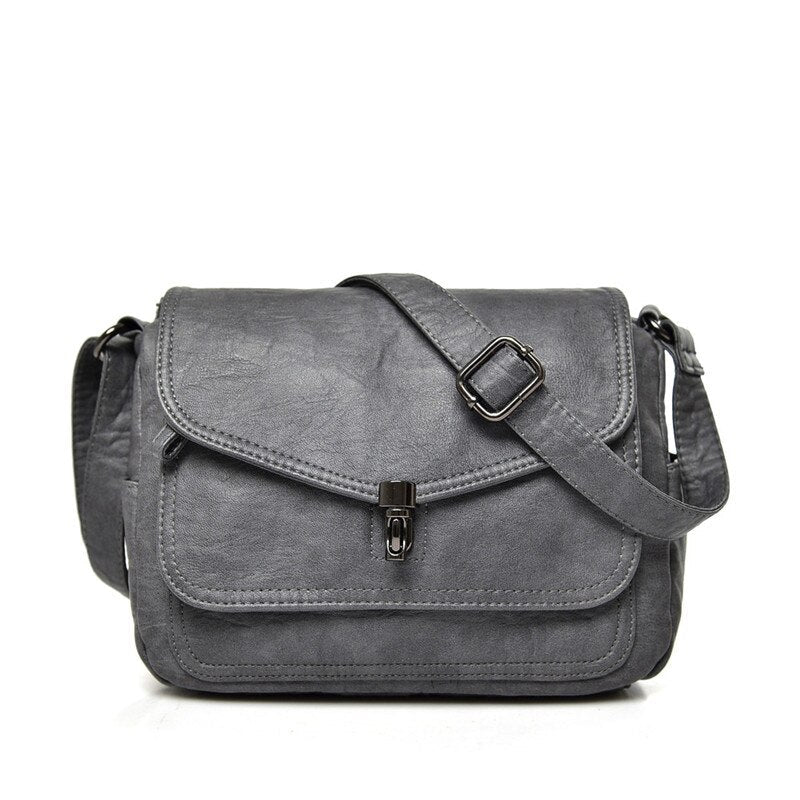 Bolso bandolera compacto con diseño minimalista y correa ajustable – CAROLYN