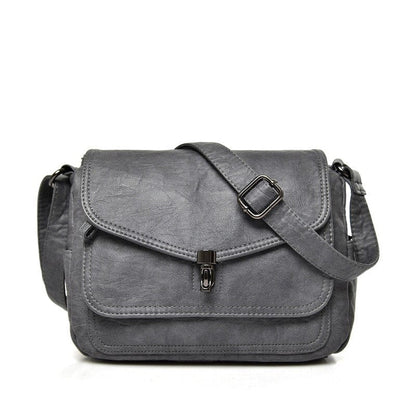 Bolso bandolera compacto con diseño minimalista y correa ajustable – CAROLYN