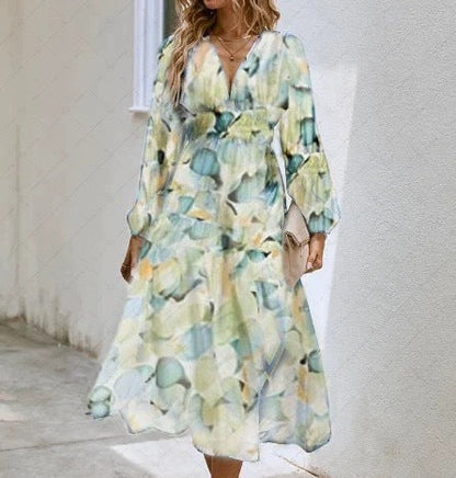 Vestido midi floral con vuelo romántico y escote cruzado – AMARELLA