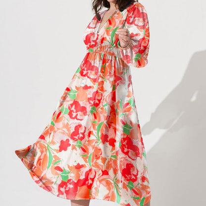 Vestido midi floral con vuelo romántico y escote cruzado – AMARELLA