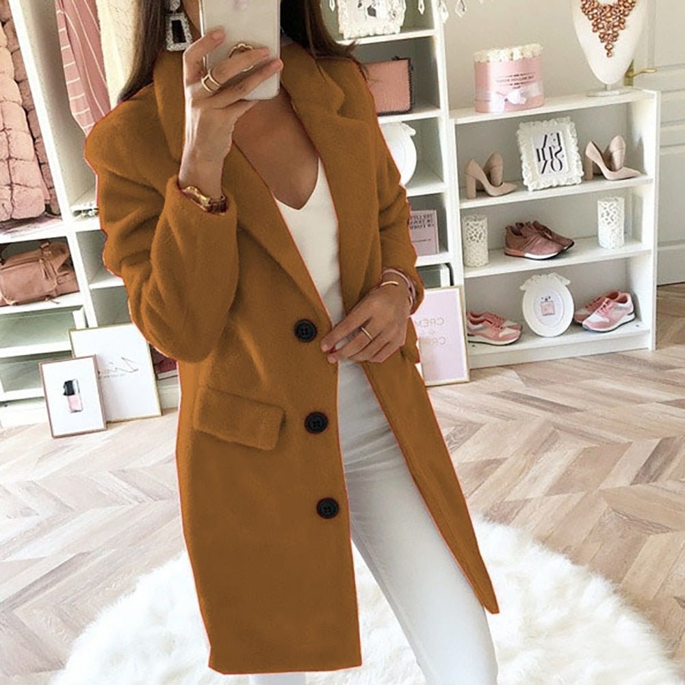 Blazer larga entallada con doble botonadura y solapa clásica – NERIZA