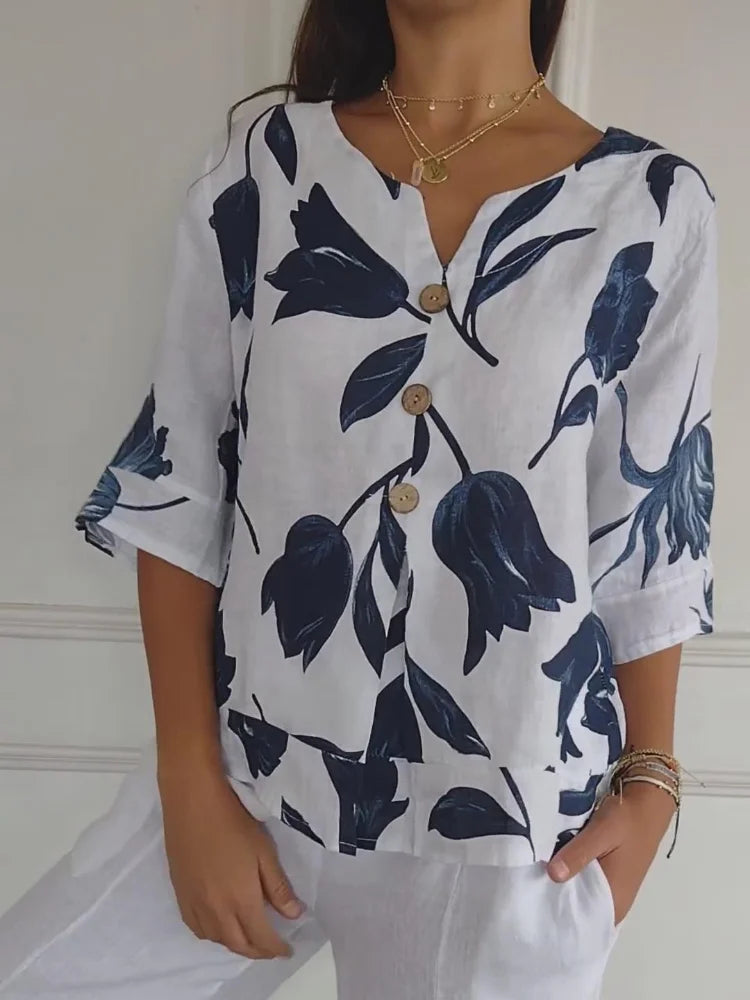 Blusa de flores con botones decorativos y manga 3/4 – FLORIANA BLOOM