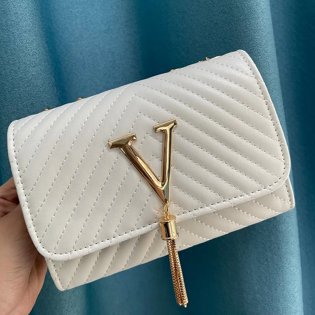 Bolso de mano con borla decorativa y diseño moderno – GLAMIRA