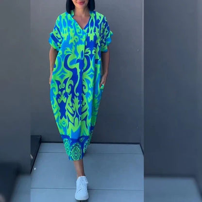 Vestido largo con estampado floral y corte fluido – ELEONORA